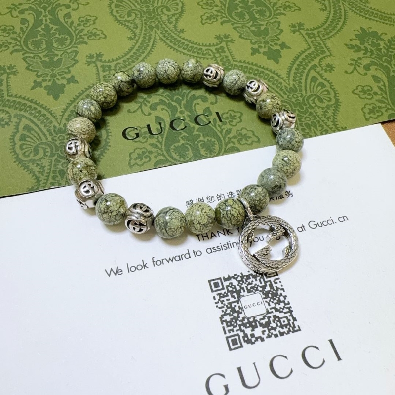 G*u*i bracelets